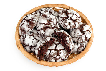 Chocolate brownie cookie in a wicker basket isolated on white background. Top view. Flat lay