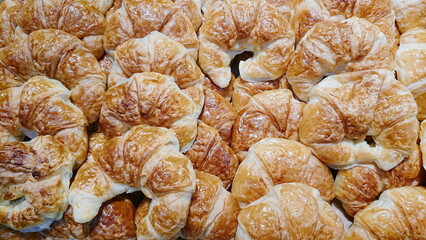 Full frame of croissants.