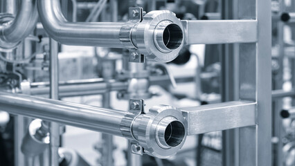 Stainless steel pipes in food or pharmaceutical or chemical industrial factory, industrial concept...