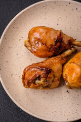 Delicious Asian dish with chicken legs in teriyaki sauce with salt and spices
