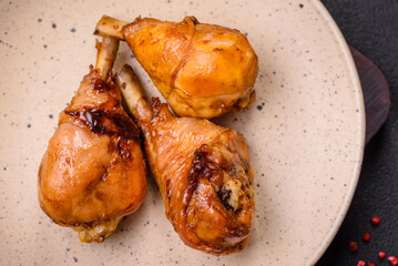 Delicious Asian dish with chicken legs in teriyaki sauce with salt and spices