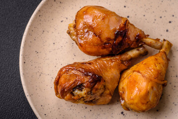 Delicious Asian dish with chicken legs in teriyaki sauce with salt and spices