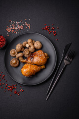 Delicious Asian dish with chicken legs in teriyaki sauce with salt and spices