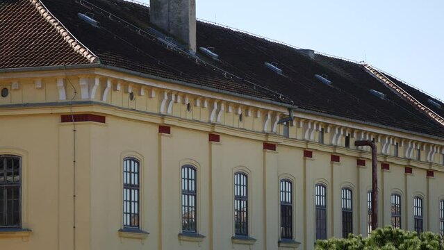 Roof of a house with lightning rods. Warm sunny day.  Rovinj, Croatia - February 13, 2023