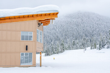 modern apartment building with beautiful winter snowfall landscape in Vancouver, Canada, North America