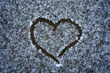 a heart painted on snow