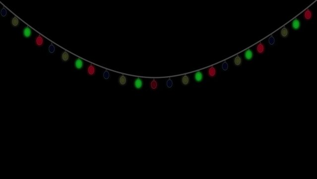 Multicolored garland light bulbs are isolated on a black background. Flashing blue, red, yellow and green light bulbs