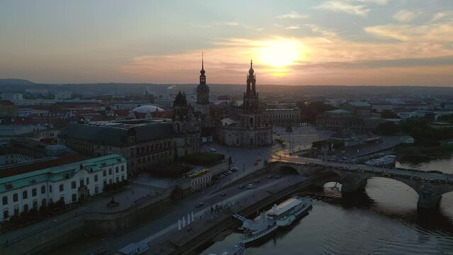 Wonderful aerial view flight drone. Sunset town Dresden Cathedral Bridge River