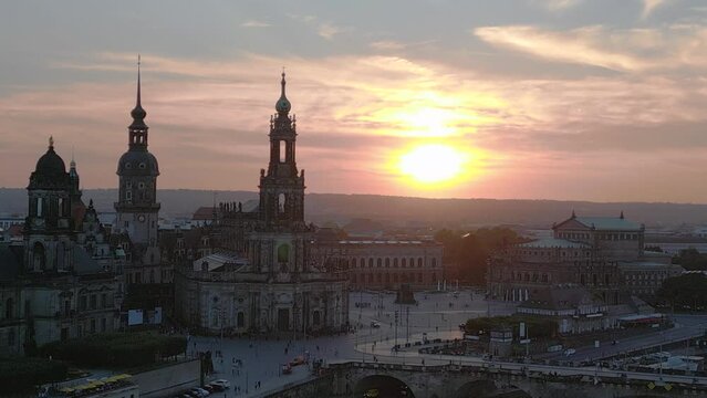 Nice aerial top view flight drone. Sunset town Dresden Cathedral Bridge River