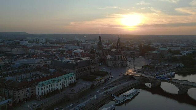 Nice aerial top view flight drone. Sunset town Dresden Cathedral Bridge River