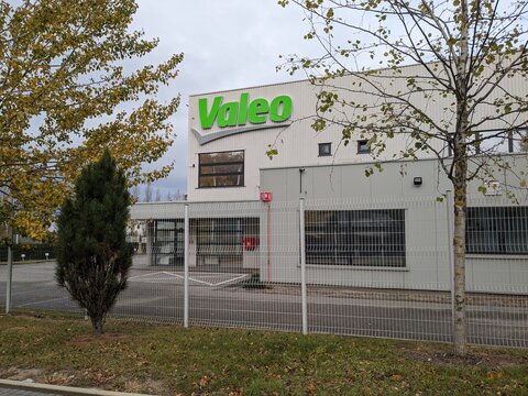Humpolec, Czech republic - November 11, 2023: Valeo logo sign. French global automotive supplier, building with brand logotype signboard.Czech factory warehouse and production plant by D1 highway
