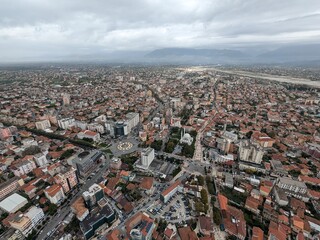 Fototapeta premium Skadar historical city with surrounding mountains and Skadar lake,Shkoder,Albania,Balkan,Europe,aerial panorama landscape view, cityscape