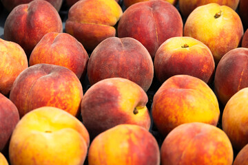 Fototapeta na wymiar Peaches in box detail - peache closeup