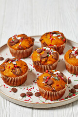 Сhristmas sweet potato muffins on plate, top view