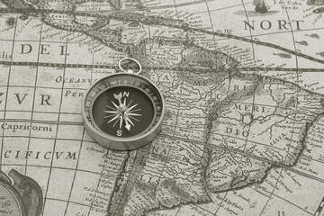round compass as symbol of tourism