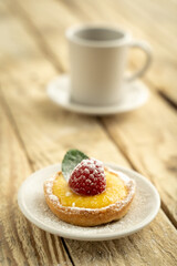 Homemade lemon pie with raspberry 