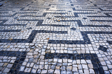 Geometric Pattern in Traditional Mosaic Paving Tiles in Braga, Portugal.