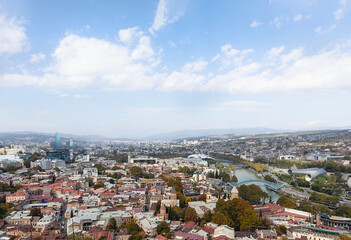 Fototapeta premium panoramic view of Tbilisi, the old city and modern buildings, churches and the river