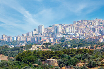 Fototapeta premium View to Agrigento town from famous ancient ruins in Valley of Temples, Sicily, Italy.