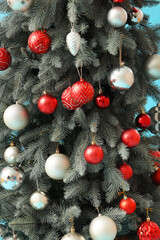Obraz na płótnie Canvas Decorated Christmas tree as background, closeup