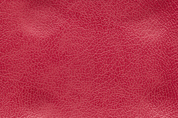 Closeup detail on red leather texture background