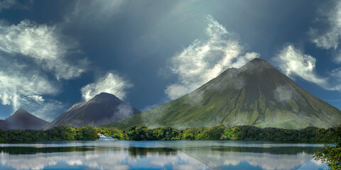 View of mountains and volcanoes together in the lake