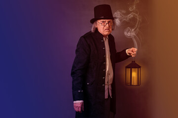 Scrooge with a lantern, smoke,  two-tone background, and space for text
