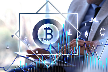 Cryptocurrency. Businessman using tablet in office, closeup. Graphs and symbols
