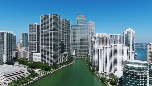 Exclusive real estate island paradise in Miami, Brickell Key, Downtown. Aston Martin Building among other skyscrapers on picturesque waterfront of ocean and bay