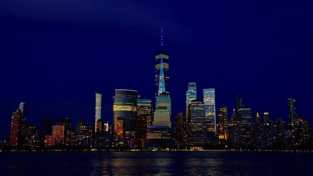 Manhattan New York time laps at night. Timelapse Sunset in New York Lower Manhattan Financial District Hudson River. From New york with love. Manhattan New York Cityscape NYC.