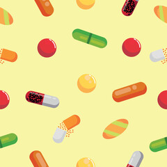 Many different pills on yellow background. Pattern for design