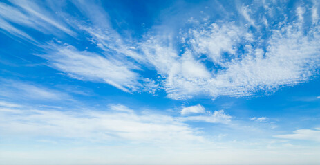 Wispy clouds in a blue sky