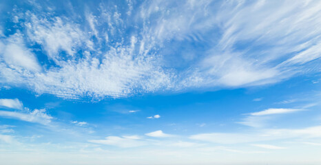 Wispy clouds in a blue sky