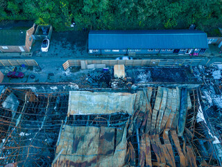 Burnt Warehouse Buildings from Drone Perspective - Aftermath Scene