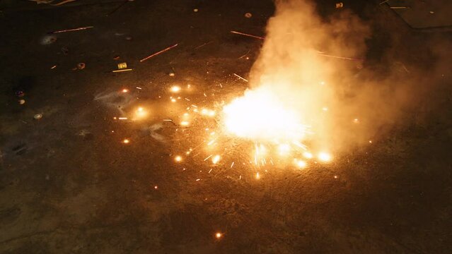 Diwali celebrations in the streets of Chennai in India, fireworks being lit,