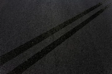 Foto op Canvas Doubles lignes noires sur asphalte  © Unclesam