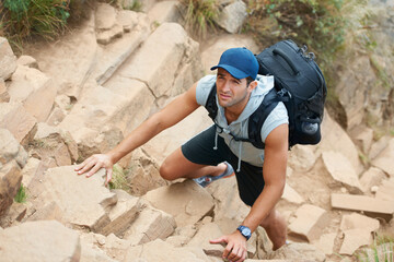 Fitness, hiking and rock with man and climbing in nature for adventure, health and performance....