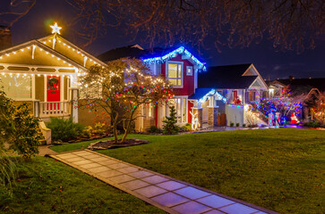 Vancouver, Canada, November 25, 2023: House Decorated and Lighted for Christmas at Night.