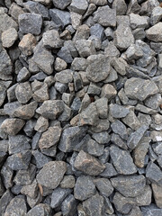 Material coral stone for the road foundation layer. Coral stone background.