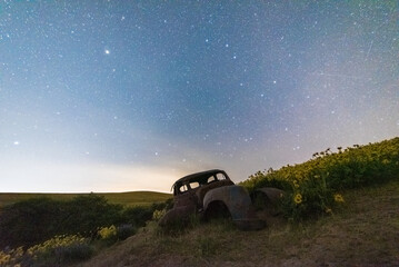 Fototapeta na wymiar Antique Car Under Night Sky