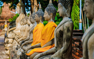 Ayutthaya, Thailand Wat Yai Chaimongkol, Buddha statue outside temple, Ayutthaya Historical Park...
