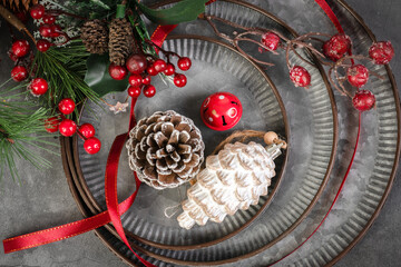 Christmas twigs and decorations on dark background