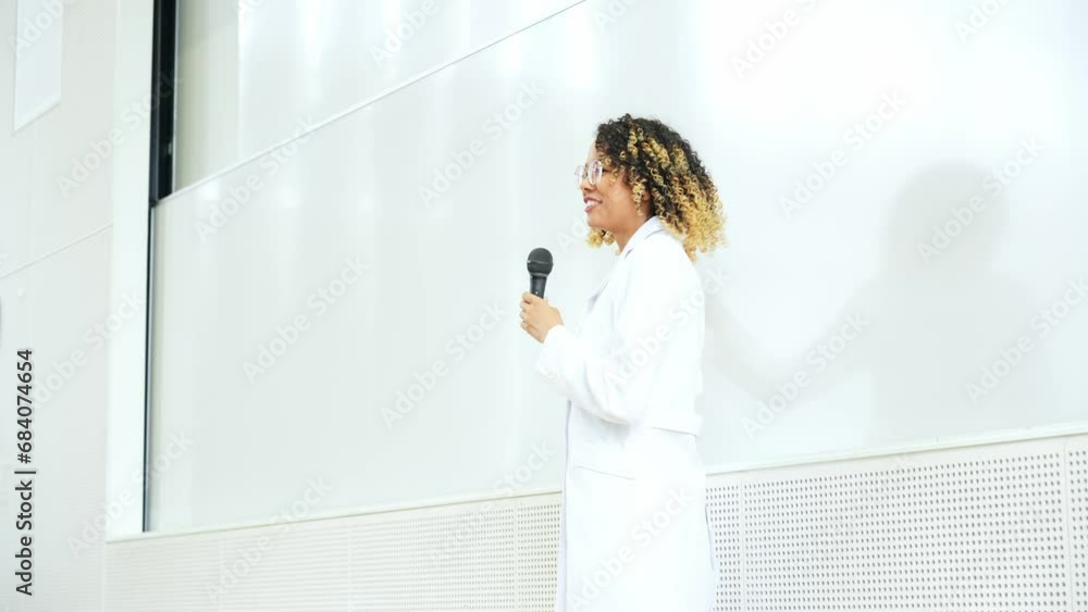 Aufkleber female lecturer giving a lecture in the auditorium. university professor. science student.