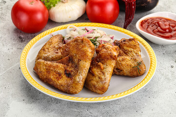 Grilled chicken wings with sauce
