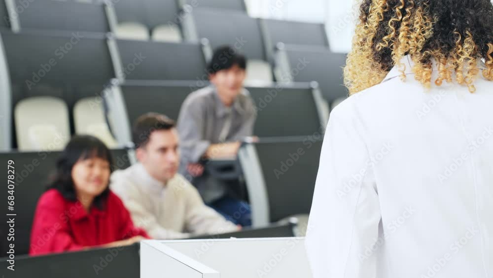 Aufkleber a female lecturer giving a lecture in the auditorium and multinational students listening.