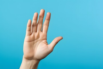 Excited person raising hand in triumph against blue sky background with copy space Generative AI