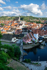 City panorama with Vltava river, house roofs and church in Cesky Krumlov, Czech Republic.