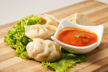 Veg Momos or Steamed Momos With Tamato Chilli Sauce