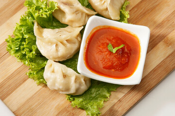 Veg Momos or Steamed Momos With Tamato Chilli Sauce