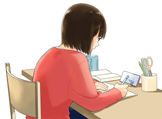 スマホを見ながら勉強する若い女性